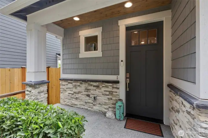 Covered front porch welcomes you to this bright light filled home.