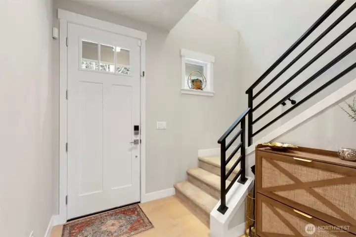 Engineered hardwood floors greet you at the front door and throughout the main floor.  Stairs lead to the second floor with 3 bedrooms, 2 full baths, office/den, and laundry room.