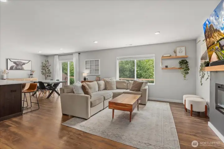 True great room - room for side serving/storage tables, large ding space and doors leading to the huge patio! True great room - room for side serving/storage tables, large ding space and doors leading to the huge patio!