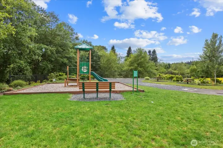 Community park with benches, picnic areas, and playground! Community park with benches, picnic areas, and playground!