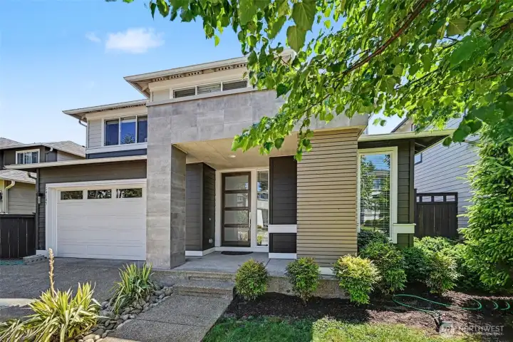 Showcasing exceptional curb appeal with timeless colors, elegant stone accents, & established landscaping, this home makes a lasting first impression. Showcasing exceptional curb appeal with timeless colors, elegant stone accents, & established landscaping, this home makes a lasting first impression.