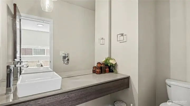 Convenient main floor half bath. Convenient main floor half bath.