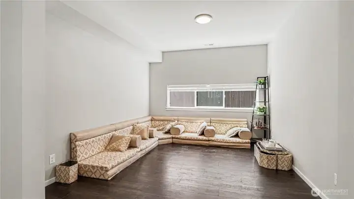 A separate seating area adds versatility for a reading nook, music room, or formal gathering space. A separate seating area adds versatility for a reading nook, music room, or formal gathering space.