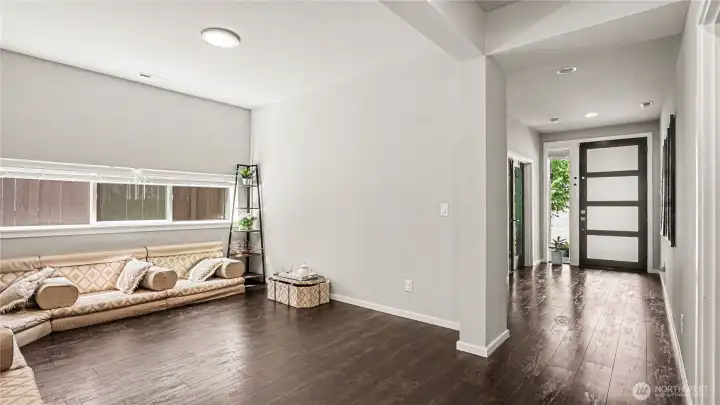 Seating area is located between the entrance and living room. Seating area is located between the entrance and living room.