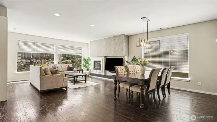 Thoughtfully designed floor plan features an open-concept dining area, living room, and kitchen ideal for everyday living and entertaining. Thoughtfully designed floor plan features an open-concept dining area, living room, and kitchen ideal for everyday living and entertaining.