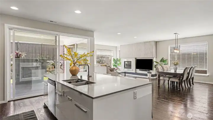 The large island with sink and abundant storage also offers seating for casual meals. The large island with sink and abundant storage also offers seating for casual meals.