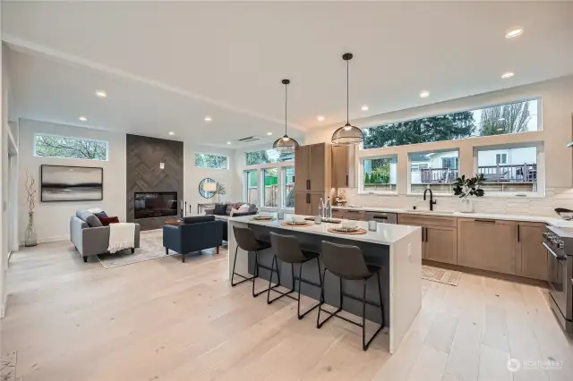 Waterfall island in kitchen with seating for 3.