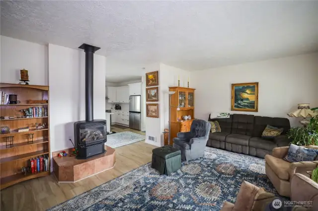 Living room w/ Gas stove.