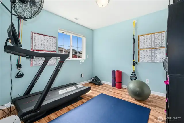 Upper level bedroom (currently used an an exercise room).