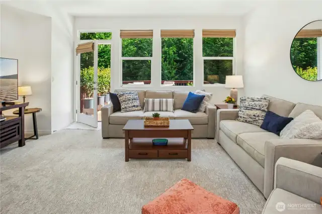 The greatroom opens to the oversized deck