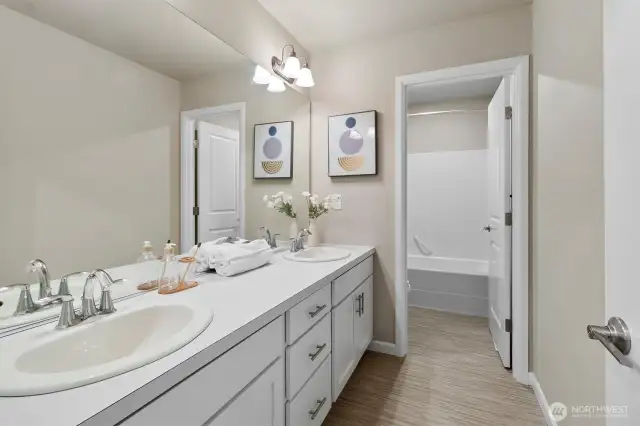 secondary bath room, with privacy door to tub and toilet