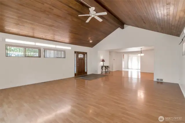 Great living room, formal dining room and kitchen with eating space viewed from the great picture window in the front room