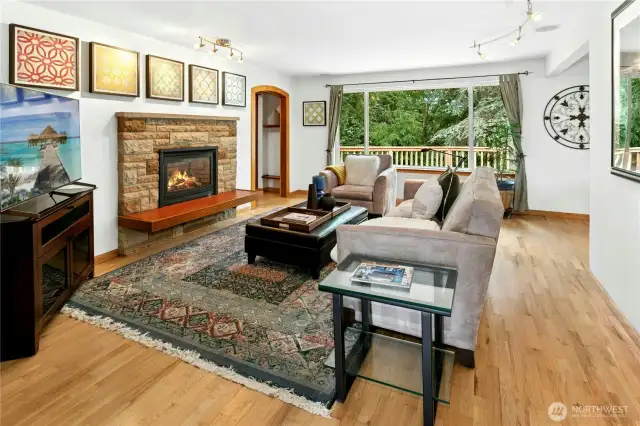 Gas fireplace and oak floors.