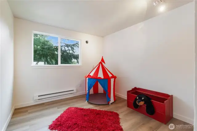 Bedroom with new luxury vinyl floors and fresh paint