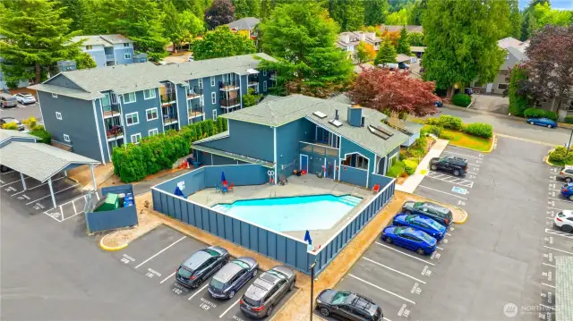 Outdoor community pool is perfect to enjoy a splash to cool down on a hot summer day