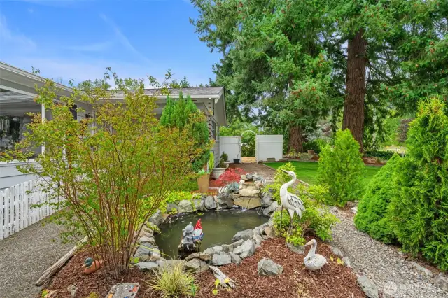 Tranquil waterfall pond area.