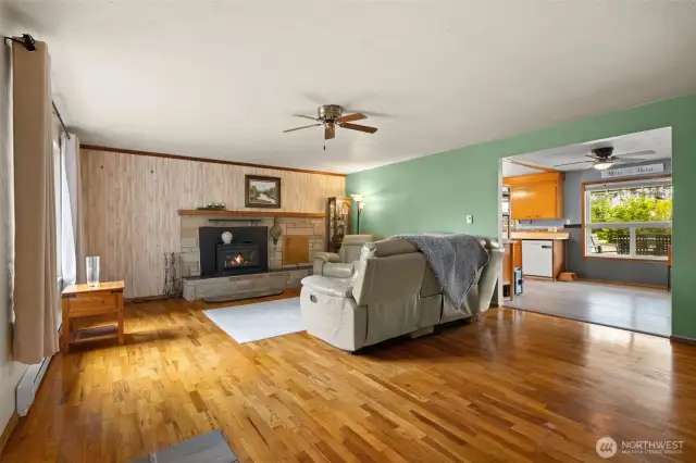 Beautiful hardwood flooring. Cozy woodstove insert.