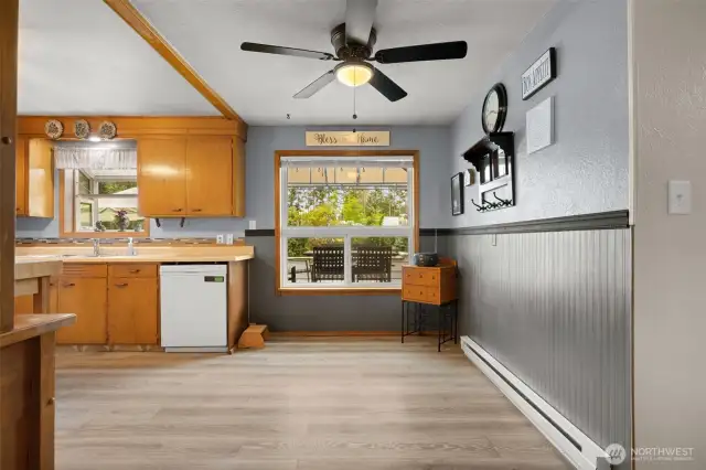 Newer wainscoting, interior paint and flooring.