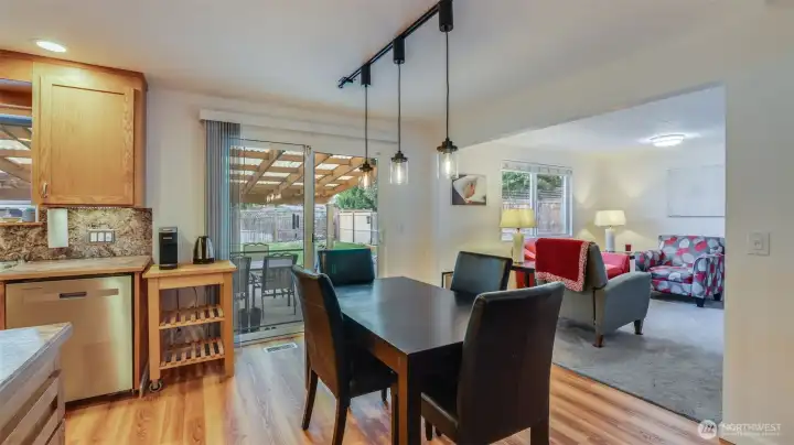 Open dining area with seamless flow to the second living room and easy access to the covered patio for indoor-outdoor living.