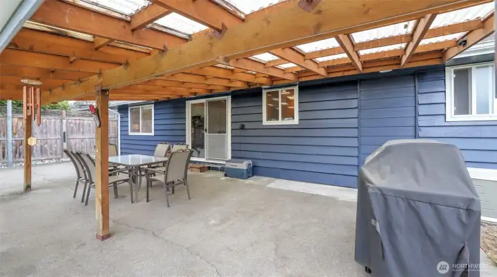 This covered patio is ideal for year-round entertaining or quiet morning retreats.