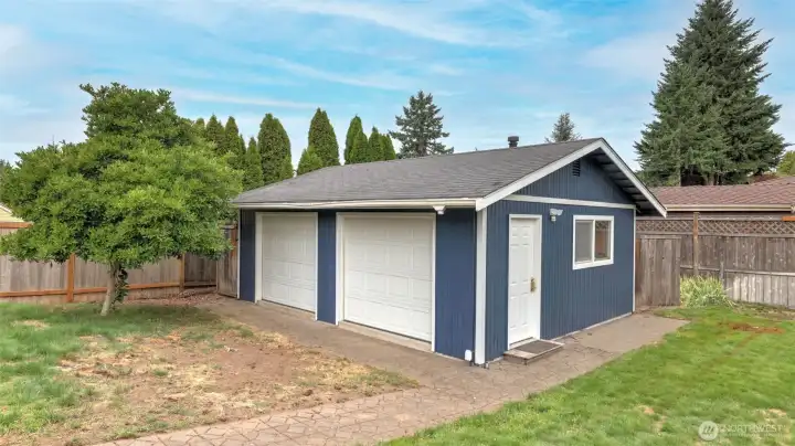 Spacious detached two-car garage, perfect for vehicles, tools, or hobby space.