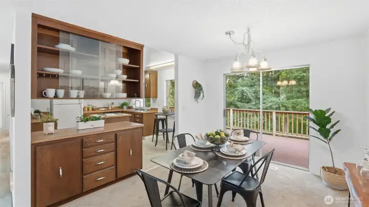Built-in cabinetry provides charm and extra storage between kitchen and dining area.