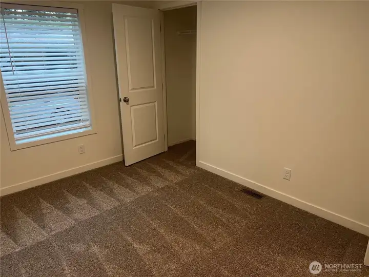 Second bedroom closet area.