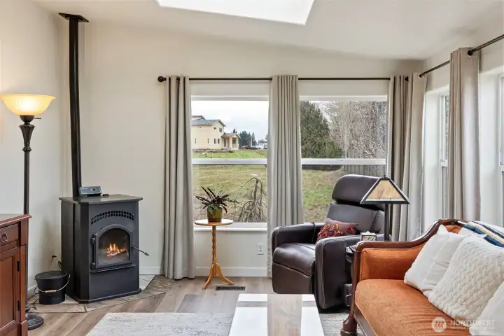 Skylights, ample windows, new drapes, new paint throughout and gorgeous new floors elevates the quality of living.