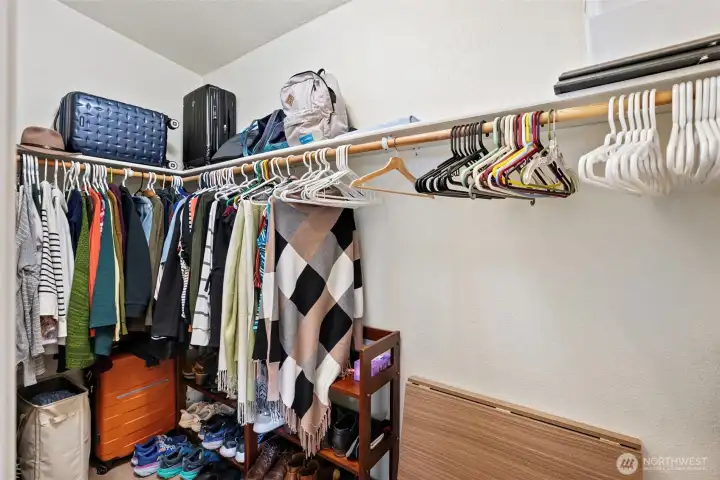 Walk right into this spacious primary closet.