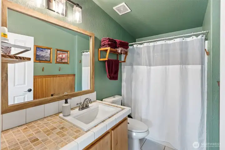 The second bath is a full 3-piece bath.