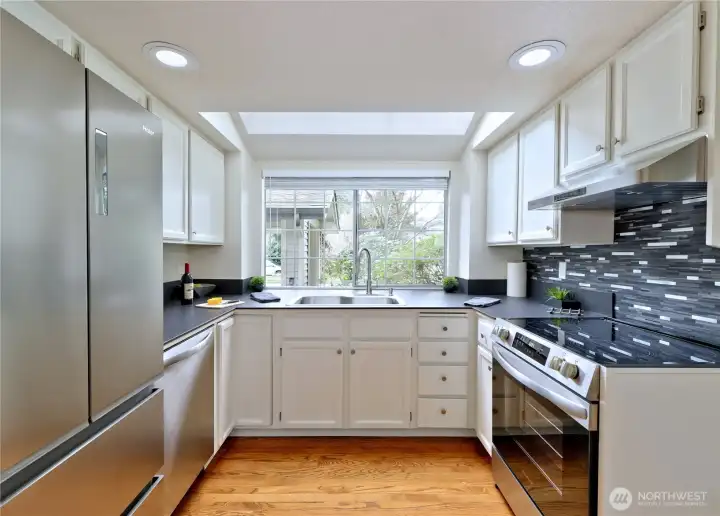 kitchen with skylight and new appliances