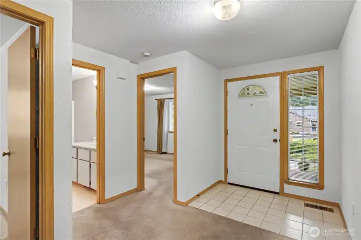 View of your tiled entry, front bedroom to your right.