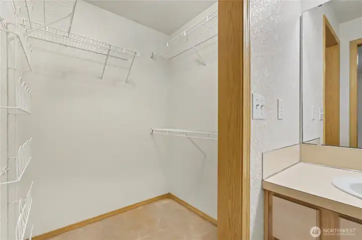 Primary walk-in closet.