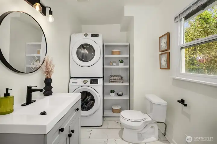 Half bath and laundry off kitchen