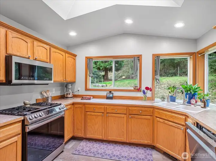 Sunny kitchen with skylight and plenty of counter space.