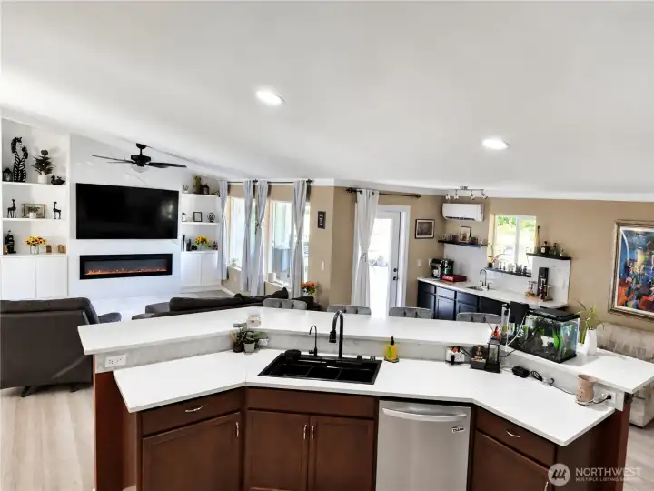 Large kitchen island with quartz countertops