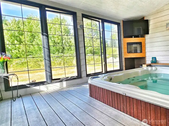 Spa inspired Hot Tub with entertainment and fireplace.