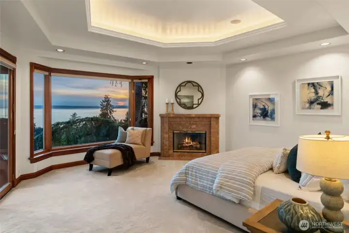 Primary suite with spa-inspired bath and walk-in closet.