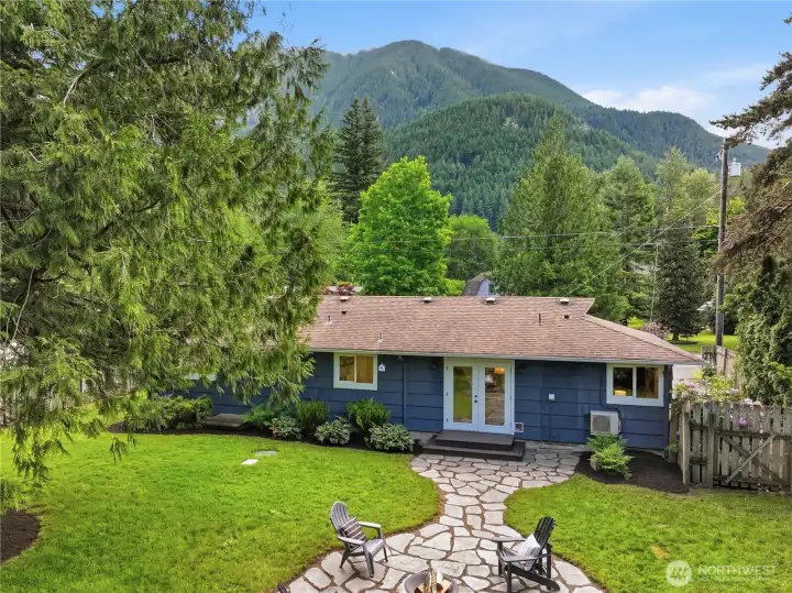 Relax on the flagstone patio while taking in refreshed landscaping and stunning views of Mount Si.