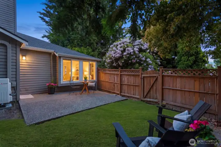 The private backyard is one of the standout features of this condo, offering a true sense of home with space for barbecues, entertaining, or unwinding with a glass of wine after a walk along the waterfront.