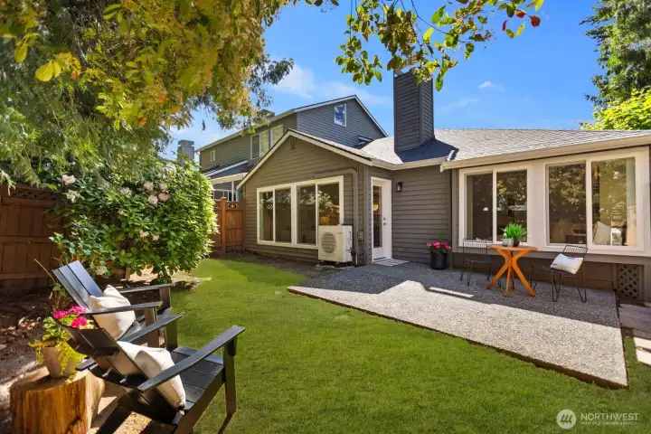 The private backyard is one of the standout features of this condo, offering a true sense of home with space for barbecues, entertaining, or unwinding with a glass of wine after a walk along the waterfront.