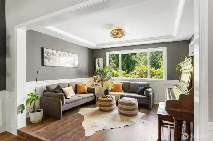 Relax and Unwind    A cozy second living space with a gas fireplace creates the perfect place to watch movies, read a book, or simply unwind after a long day.