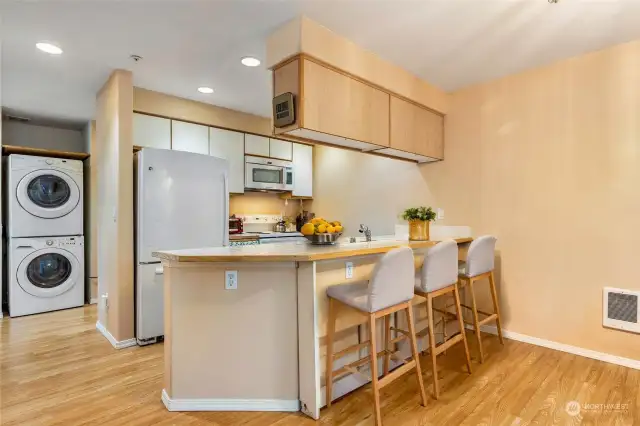 Light and bright kitchen. Home is virtually staged