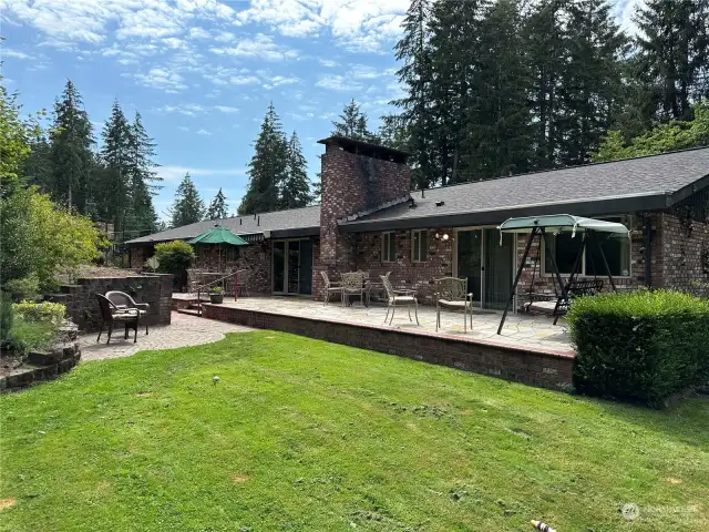 Back of home and slate patio.