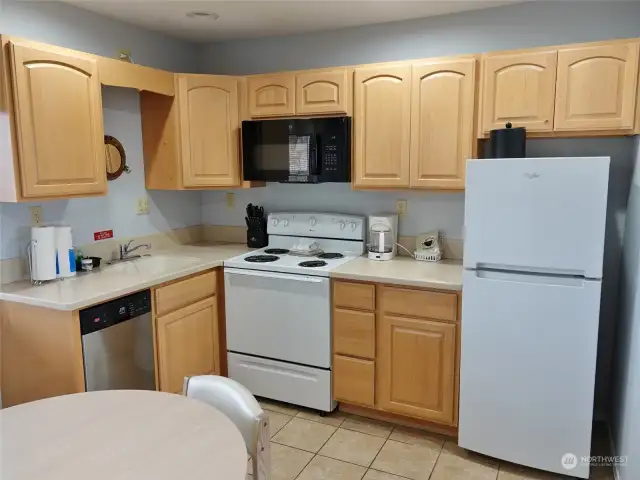 Full Kitchen w/ all appliances and Corian counters.