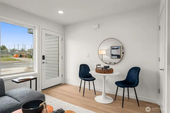Photos of model home with similar finishes & floor plan. A charming nook for your morning matcha or a quick bite before you head out—this dining corner keeps things stylish, compact, and functional.