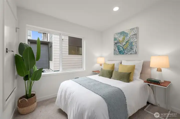 Photos of model home with similar finishes & floor plan. The second bedroom offers privacy and comfort, which is ideal for guests or a stylish home office setup.