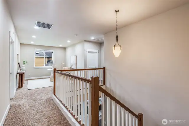 Thoughtfully designed second level featuring a spacious landing and bonus flex space—ideal for a reading nook, 2nd home office, or play area.