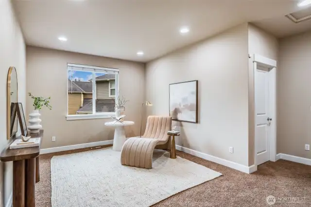 Bright and airy upstairs landing with the perfect cozy nook for reading, working, or winding down. A quiet retreat just steps from the bedrooms.