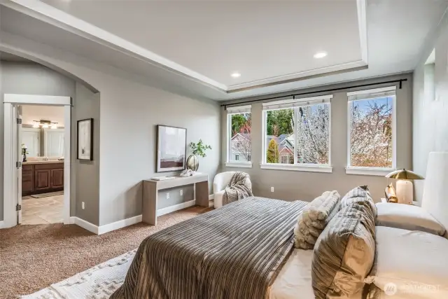 Retreat to your luxurious second-floor Primary Suite—complete with arched entry, spa-inspired ensuite, dual walk-in closets, and a serene ambiance that invites rest and relaxation.